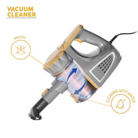 Handheld vacuum cleaner in gray and gold color, featuring a transparent dust container with airflow arrows indicating suction. Labels highlight key features: "Bagless" and "Washable with water." A black power cord extends from the back.
