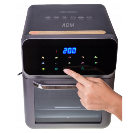 The image shows a modern, compact ADM oven. The LED display is set to 200°C and a hand is using the touch control panel to adjust the baking settings.